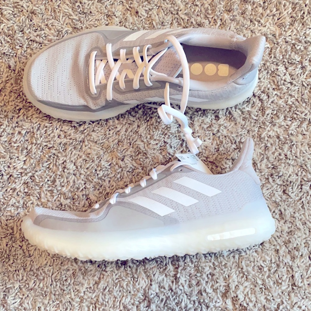 Adidas never worn woman’s training shoe.  Fit PR Trainer